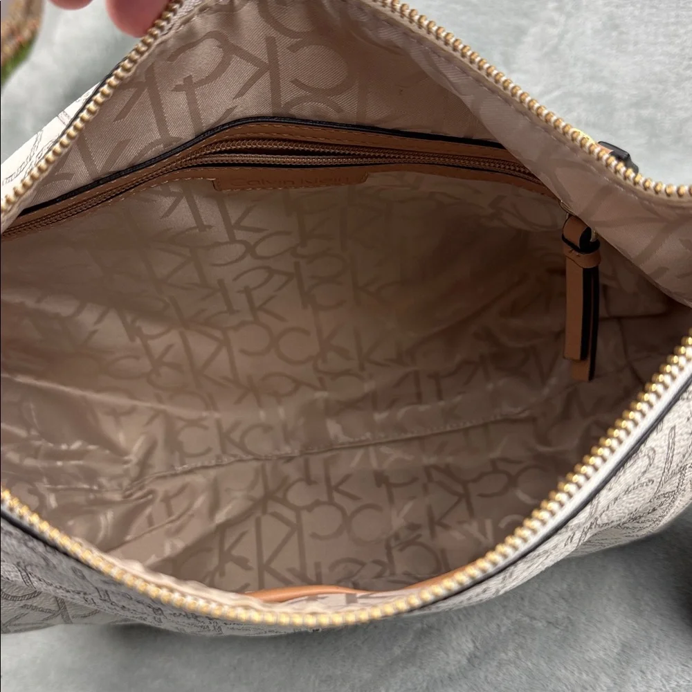 Calvin Klein Logo Print Hobo Bag in Cream and Brown
